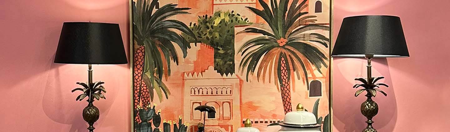 Terracotta tones inspired deco vases, table lamps, pink wall art, earthy tone interior and soft furniture