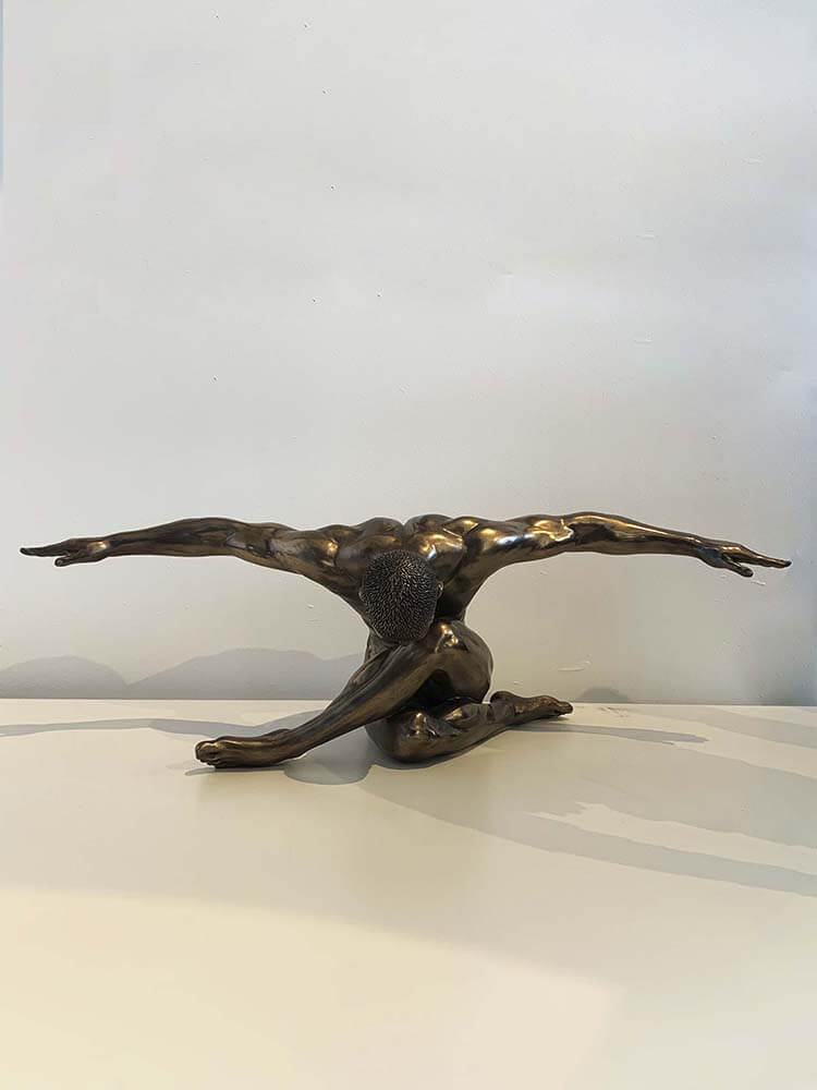 Male arm outstretch figure large bronze plated statue