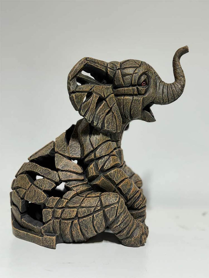 Baby Elephant Figurine, Elephant holding trunk up statue by Edge Sculpture