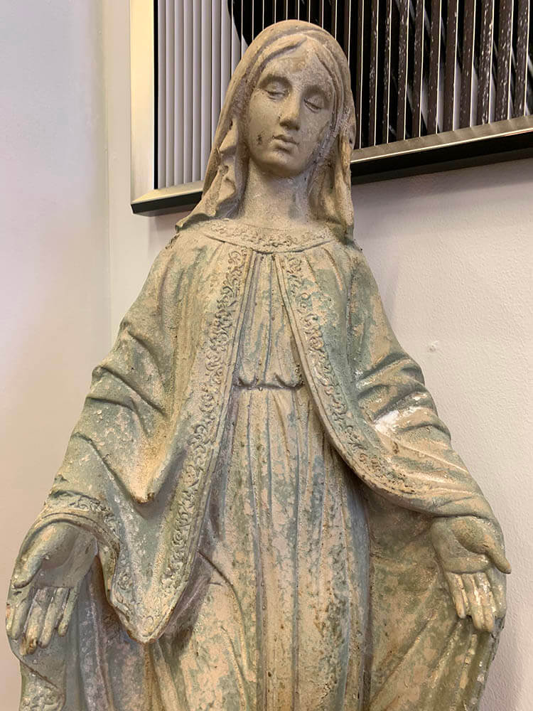 Large Madonna statue with an antiqued stone finish