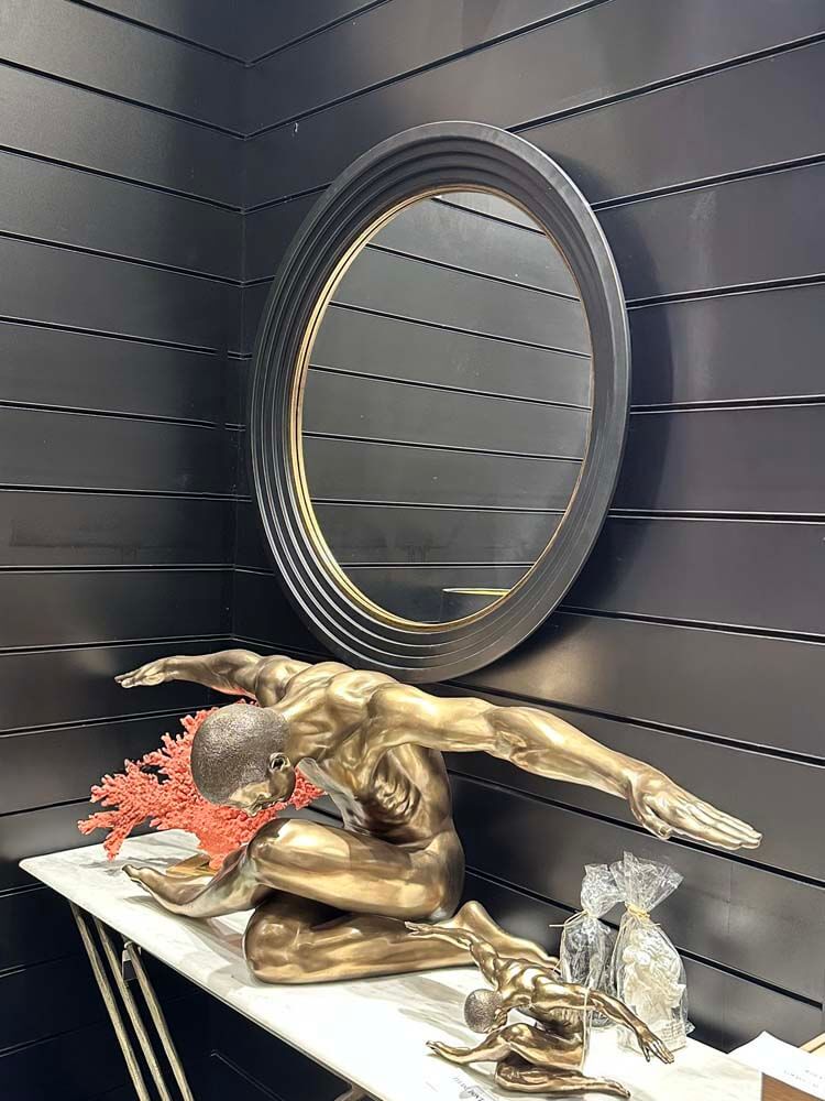 Large round wall mirror, black and gold step-framed metal mirror