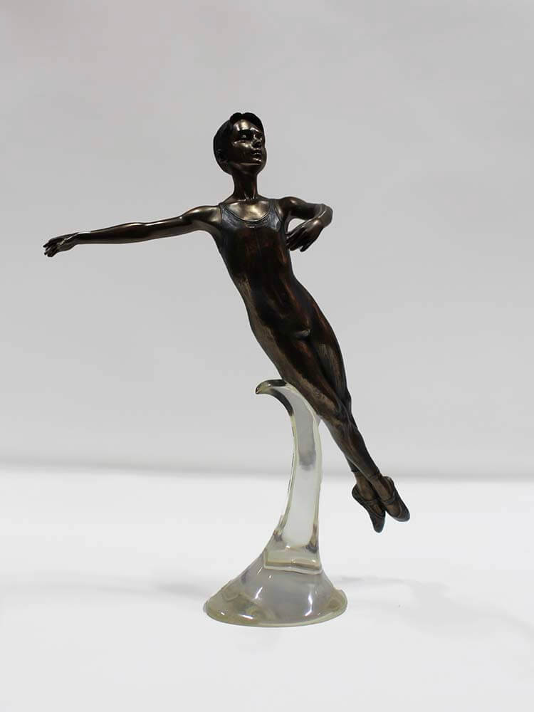 Bronze Male Ballet Dancer Statue – Elegant ballerina figure of a boy dancing in Swan Lake style by Dutch Hospital.