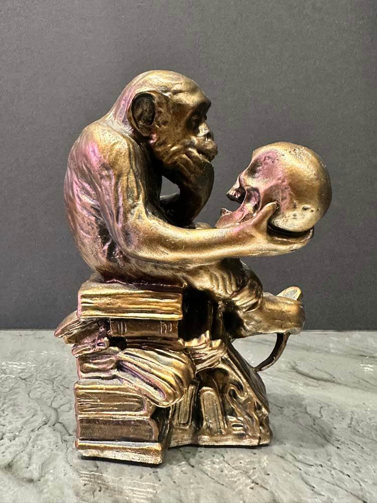 Bronze sculpture of a monkey holding a skull, The Dutch Hospital