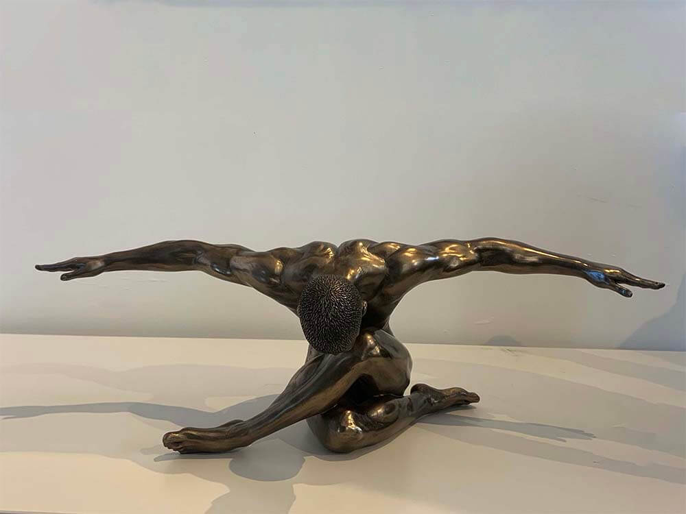 male-nude-arms-outstretched-sculpture