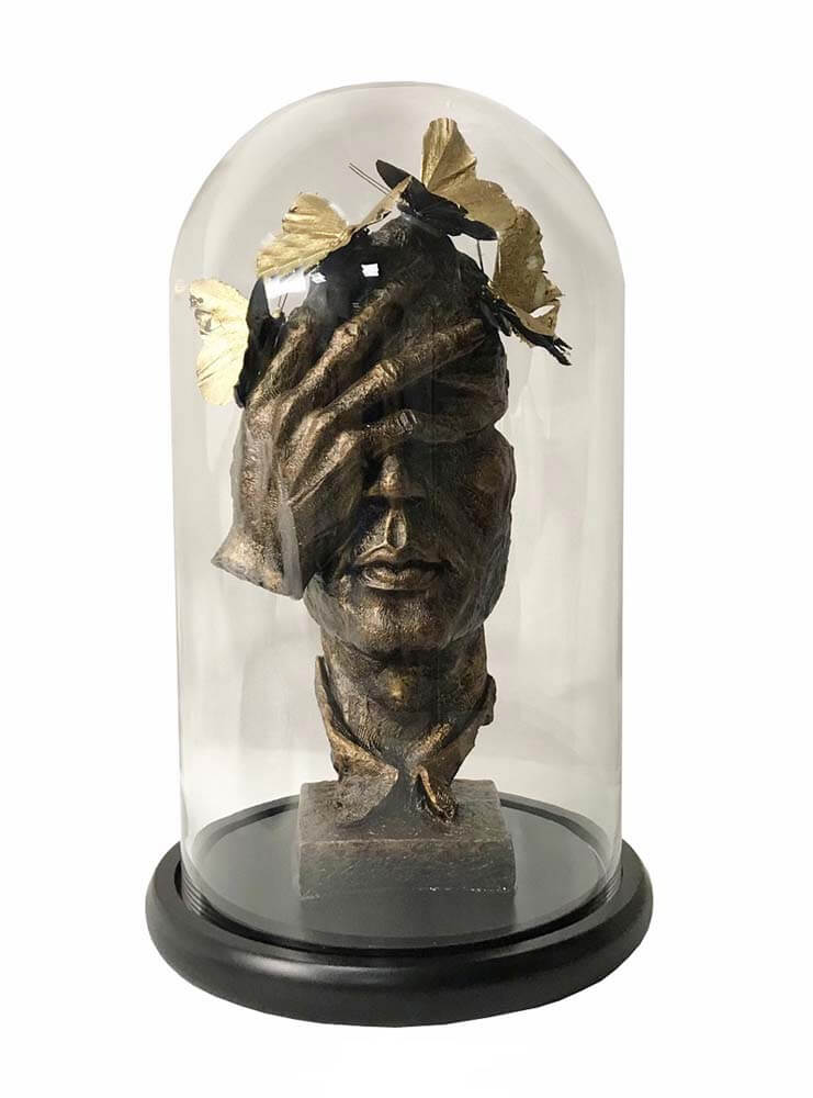 Sculpted butterfly face glass dome décor by The Dutch Hospital