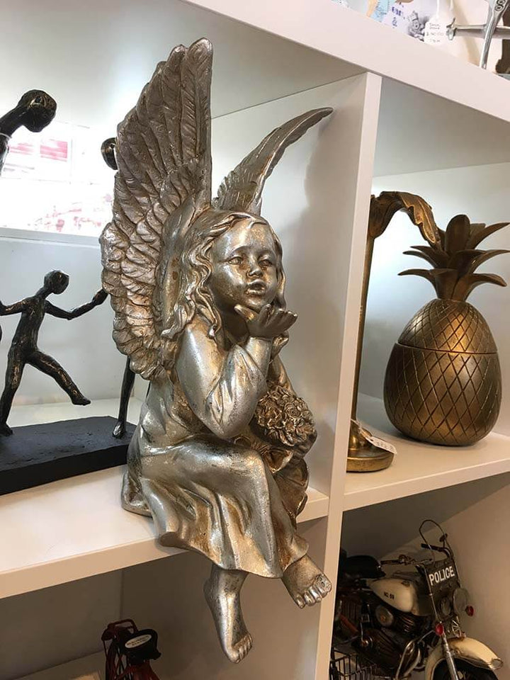 Silver angel statue