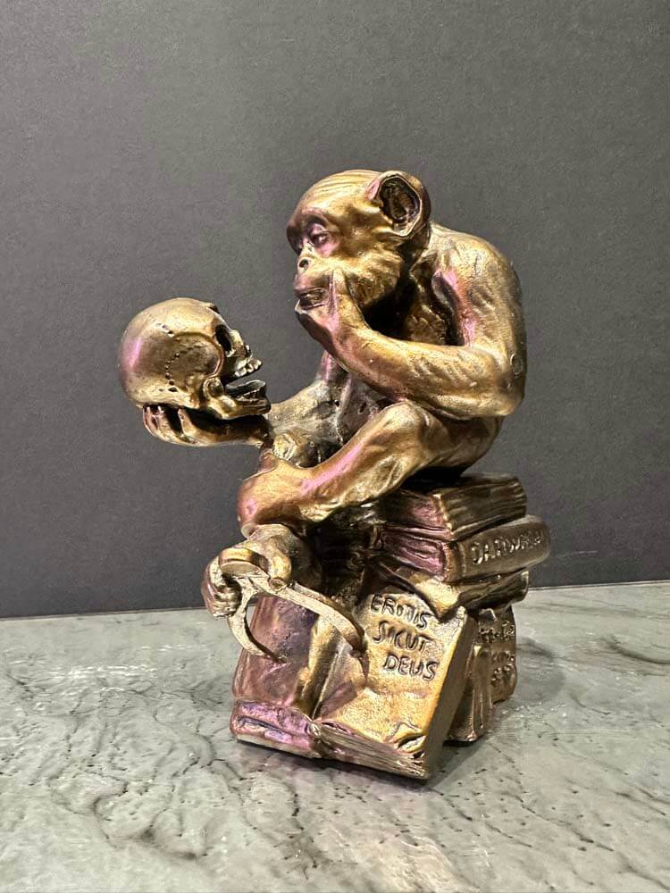 Authentic replica of Hugo Rheinhold’s Affe mit Schädel (“Monkey with Skull”), a renowned bronze sculpture