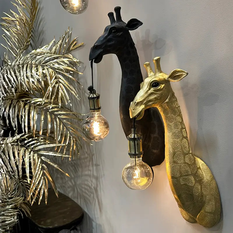 Transform your space with our striking animal wall light collection featuring giraffe and ostrich designs in luxurious black and gold. These wild animal head wall lamps blend sculptural art with functional lighting, perfect for safari-themed or eclectic interiors.