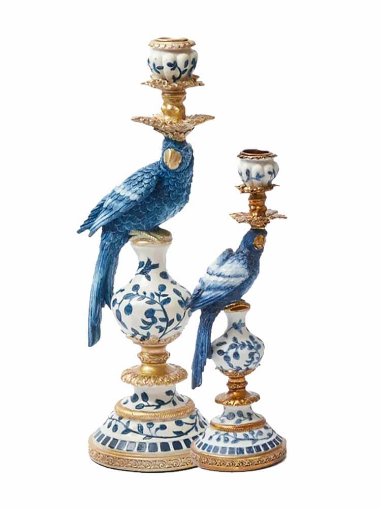 small and large blue and white parrots candle holders