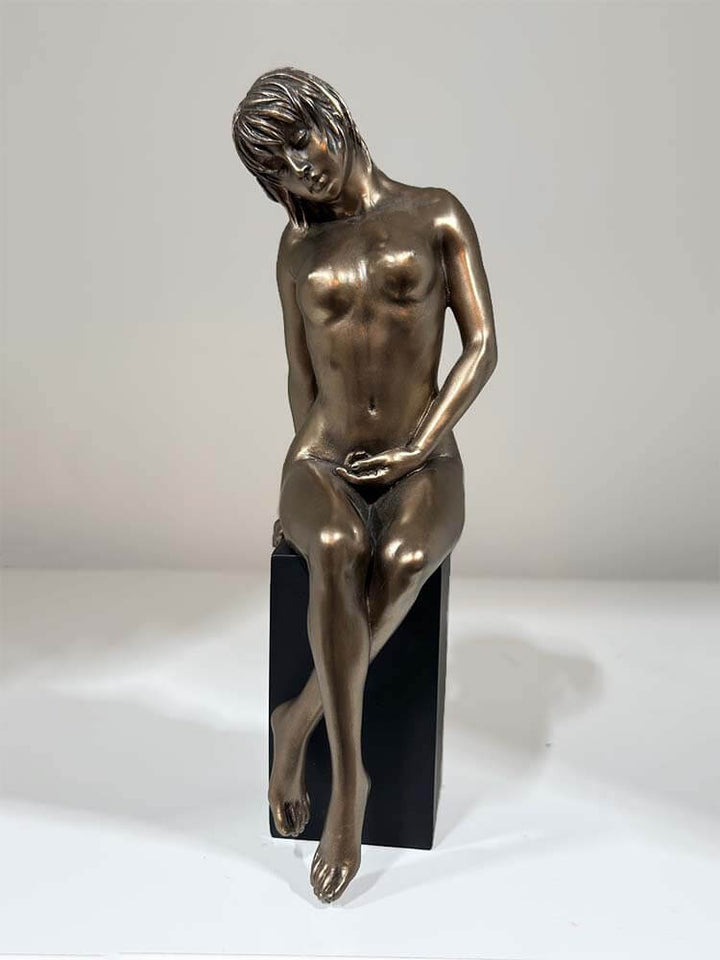 Female sculpture bronze short hair nude woman