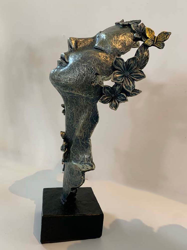 antique gold woman's face ornamental statue 
