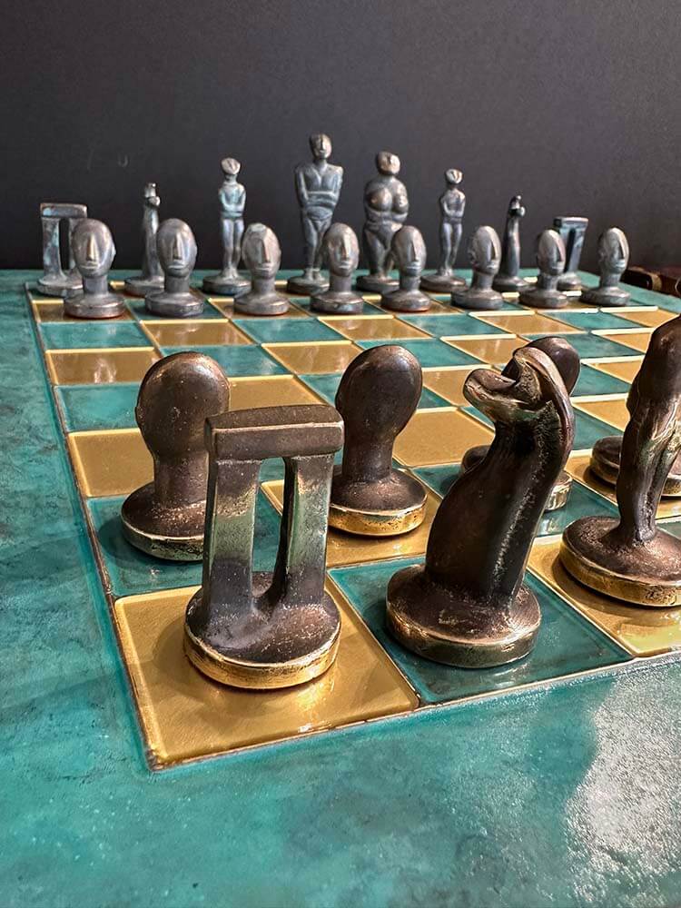 Large Cycladic Art Bronze Chess Set with solid brass chessmen in bronze and blue patina
