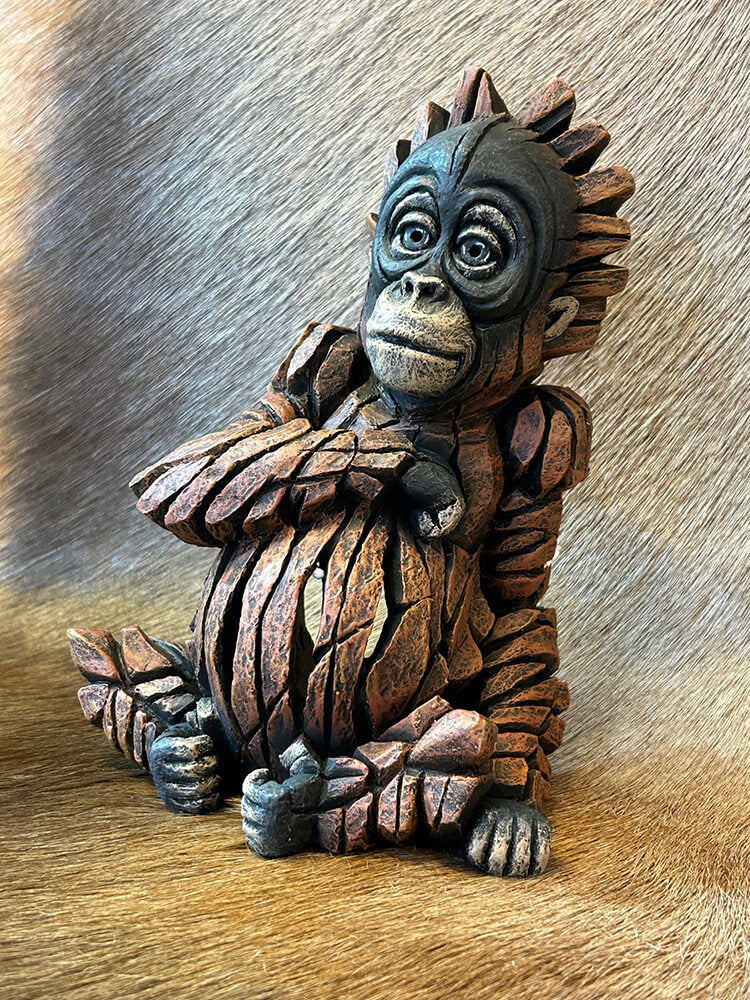 Baby Orangutan sculpture, outdoor animal figurine