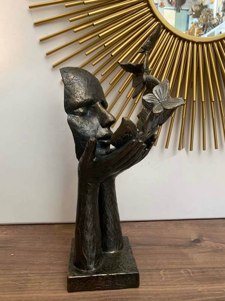 Female figurine  Blowing Butterfly Kisses Sculpture on a Base