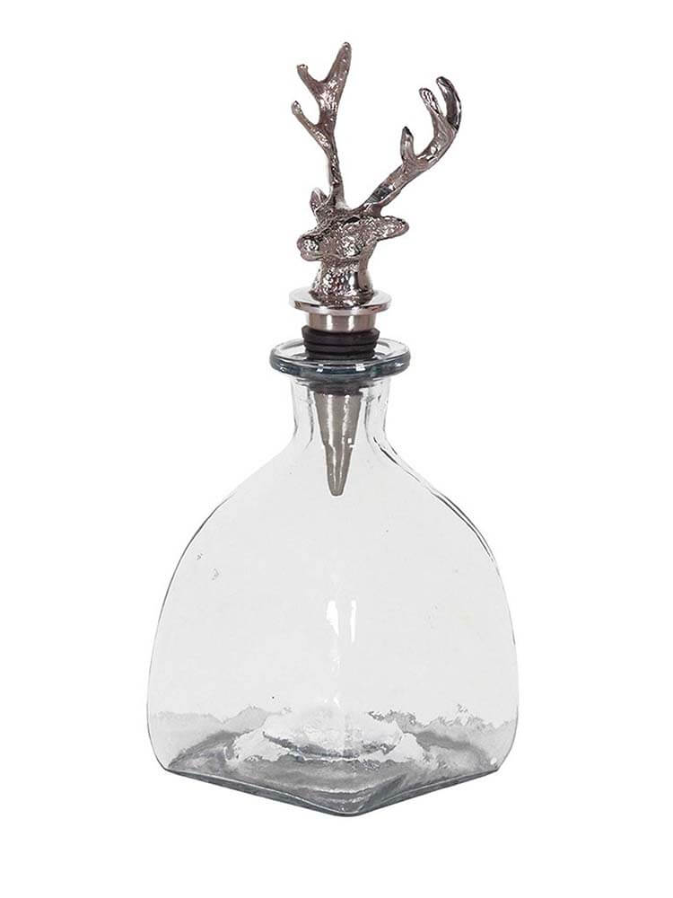 Clear glass bottle decanter with silver deer antler stopper