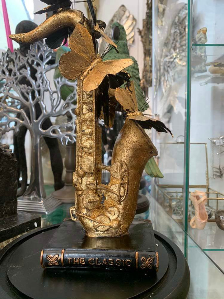 Dutch Hospital gold and black butterfly domes, Music instrument in a glass dome