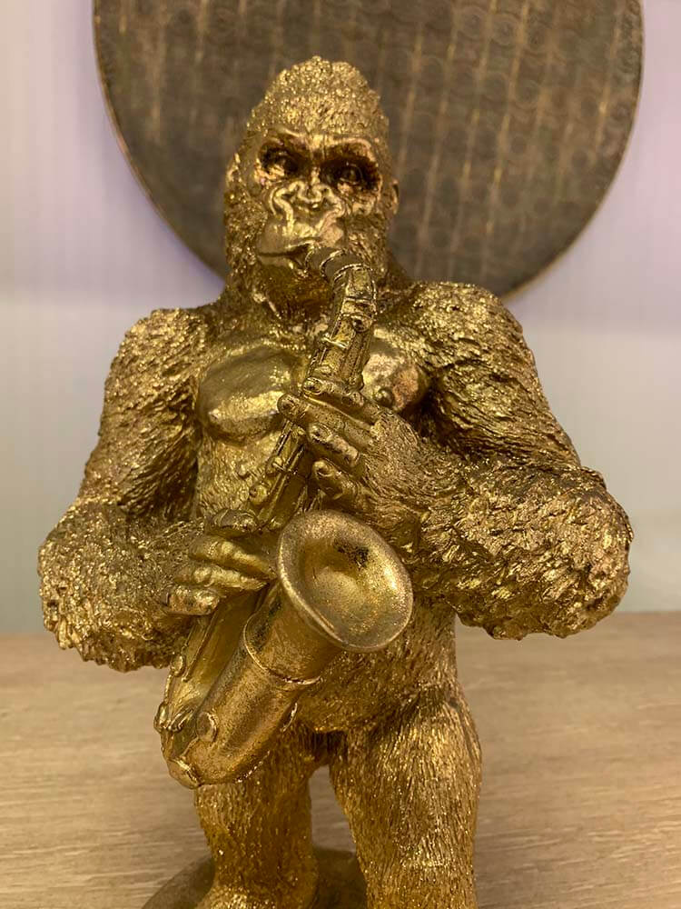Gold gorilla figurine playing a saxophone, Gorilla Playing Sax gold ornament