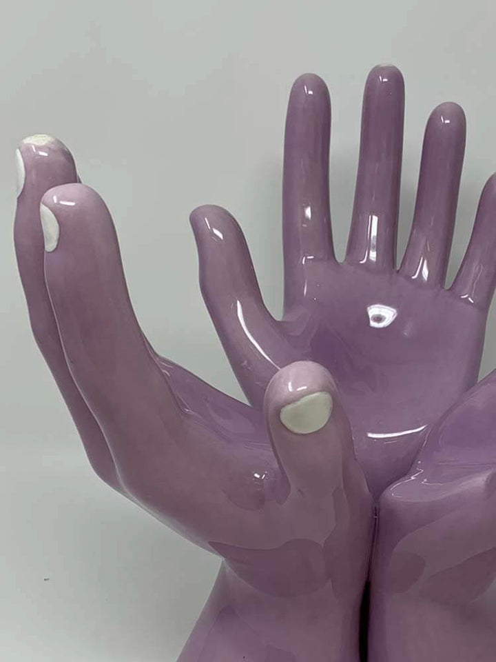 Handmade porcelain vase shaped as a graceful handstand and finished in a rich purple glaze