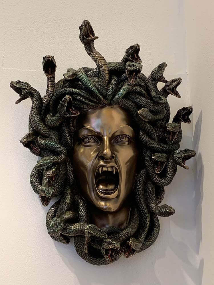Medusa head wall plaque crafted in bronze plated resin