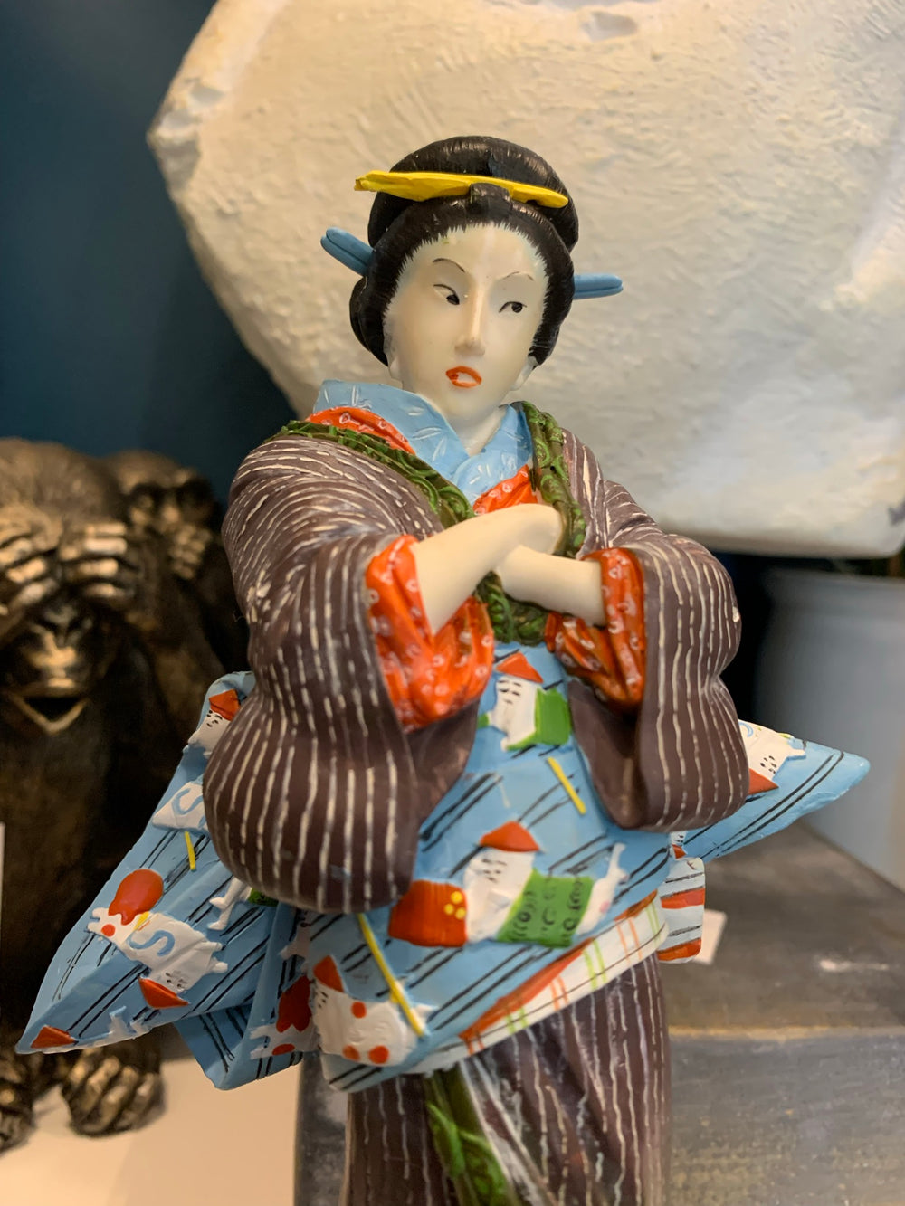 Statue of Japanese Kabuki performer inspired by Ukiyo-e style artist Eisen Ikeda