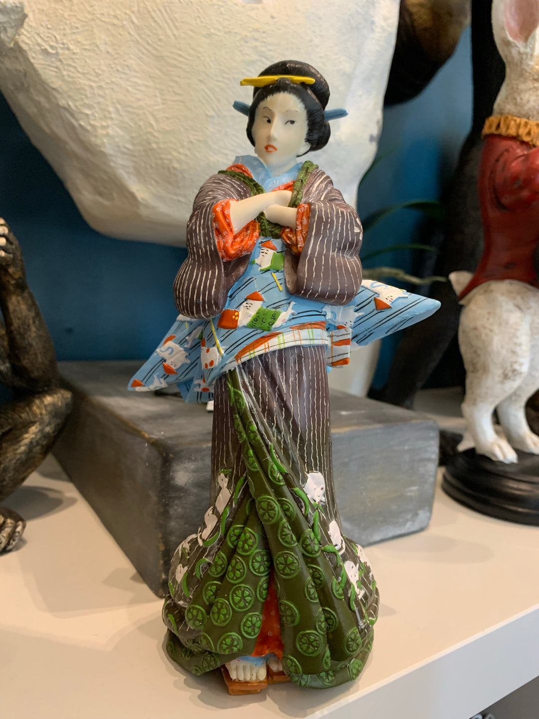Statue of Japanese Kabuki performer inspired by Ukiyo-e style artist Eisen Ikeda