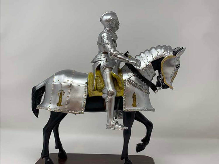 Knight on horseback statue, medieval knight statue, German knight armour, crusade era statue, silver and gold knight statue