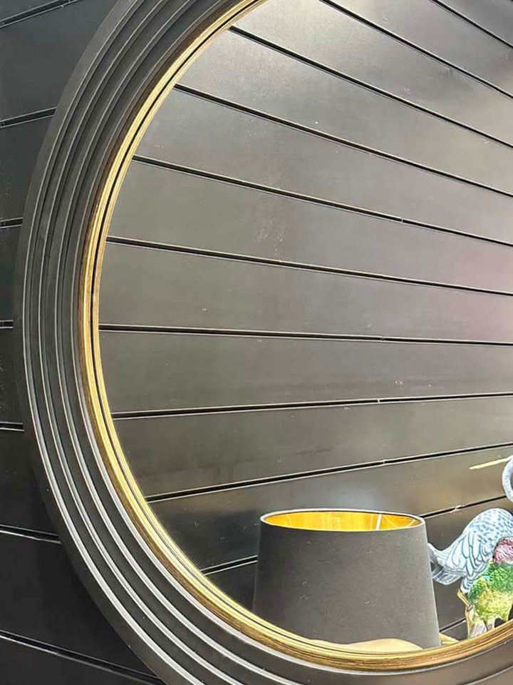 Round black frame wall mirror