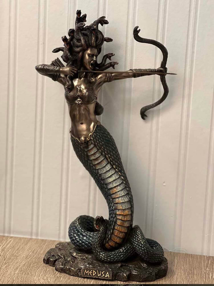 Bronze Medusa sculpture with snake hair and mermaid body