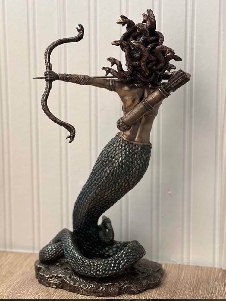 bronze statue of beautiful Medusa, mortal Gorgon, Perseus, slayer of Medusa, severed head