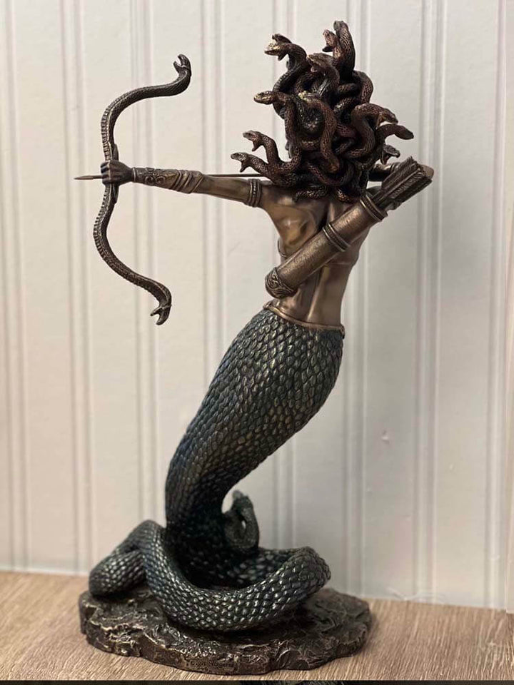 bronze statue of beautiful Medusa, mortal Gorgon, Perseus, slayer of Medusa, severed head