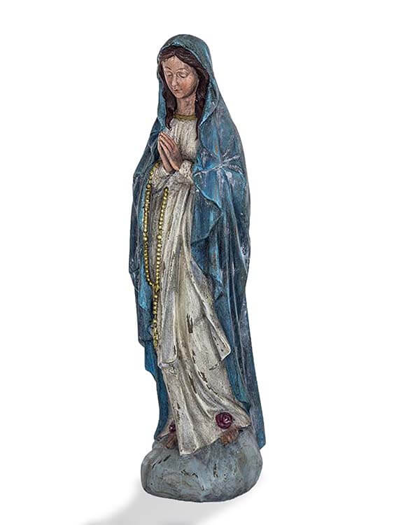 Gracefully depicted in prayer, this figurine shows Mother Mary wearing a flowing blue robe and holding a Rosary necklace—a symbol of faith, devotion, and peace.