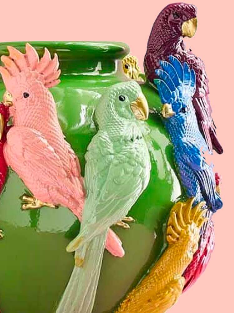 Decorative vase adorned with vibrant, multicoloured parrots