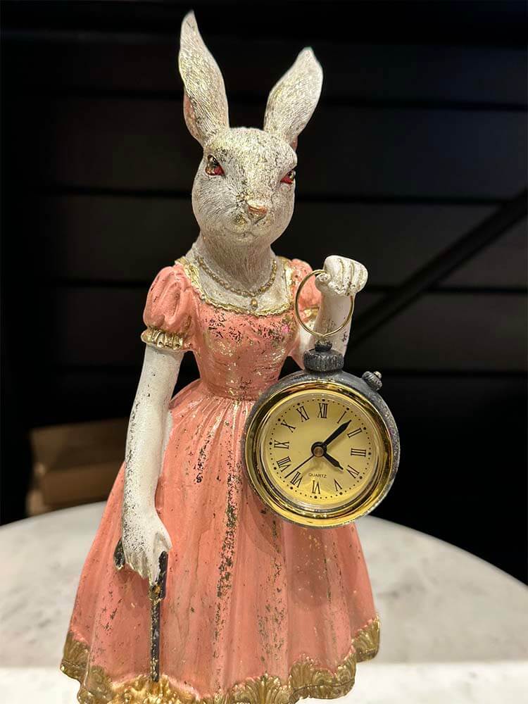 Lady Rabbit holding a pocket watch and gold umbrella, in pink with gold details for whimsical Alice in Wonderland décor.