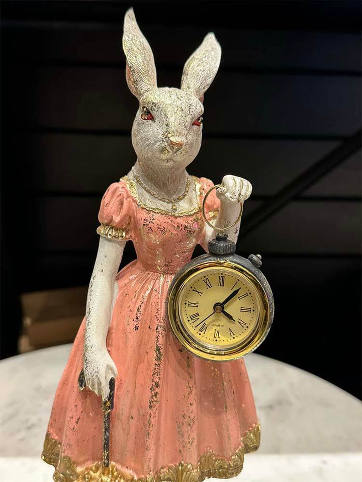 Lady Rabbit holding a pocket watch and gold umbrella, in pink with gold details for whimsical Alice in Wonderland décor.