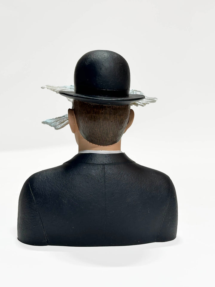 Man In A Bowler Hat " by Rene Magritte