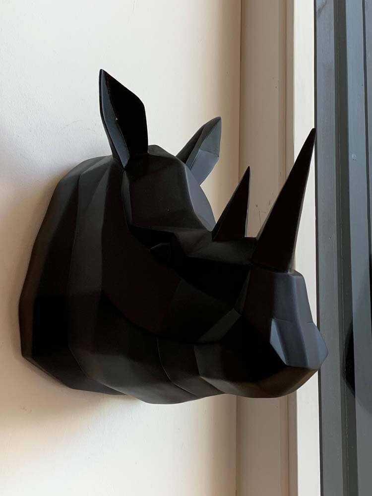 Black rhinoceros head wall decoration