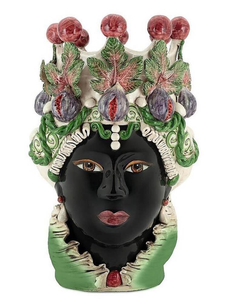 Decorative statue of a face with floral and fruit decorations, Italian Moro head vase
