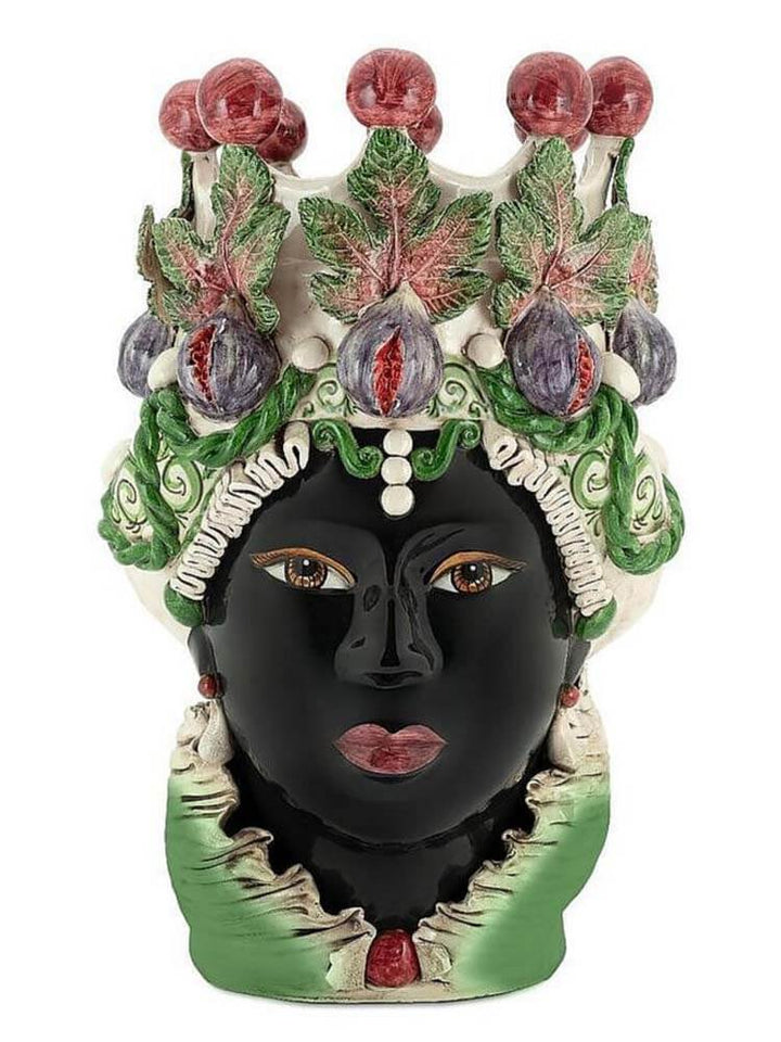 Decorative statue of a face with floral and fruit decorations, Italian Moro head vase