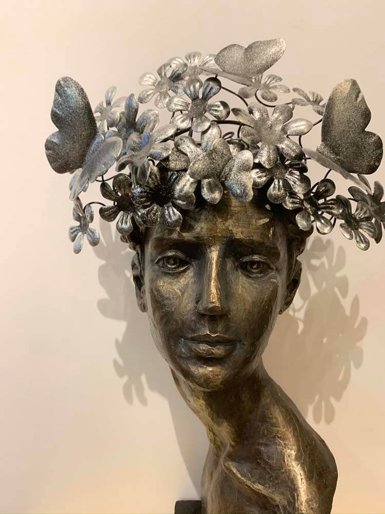 butterfly face figurine 