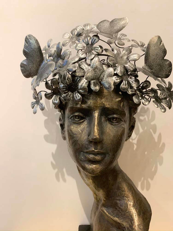 butterfly face figurine 