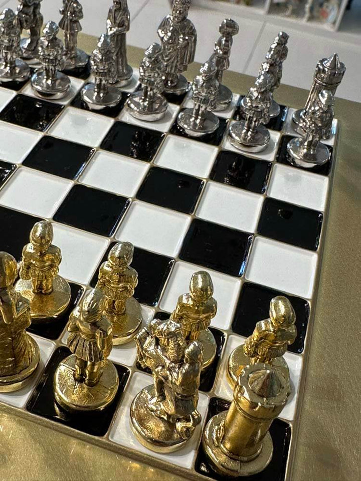 gold silver black and white chess set