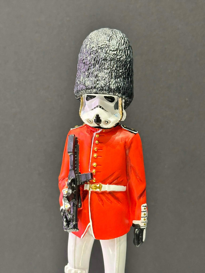 Figure of a stormtrooper in a red uniform with a helmet , Buckingham Palace Guards 
