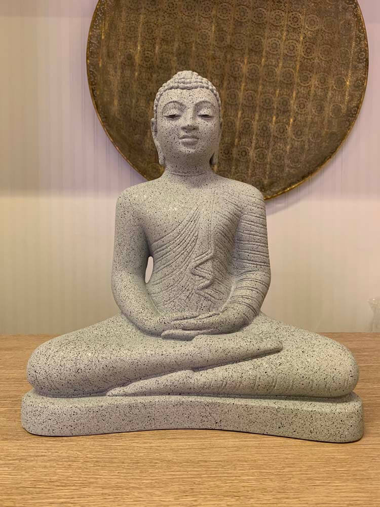 Bring calm and character to any space with this striking grey Buddha statue, crafted with a realistic stone-effect finish that adds an air of timeless spirituality