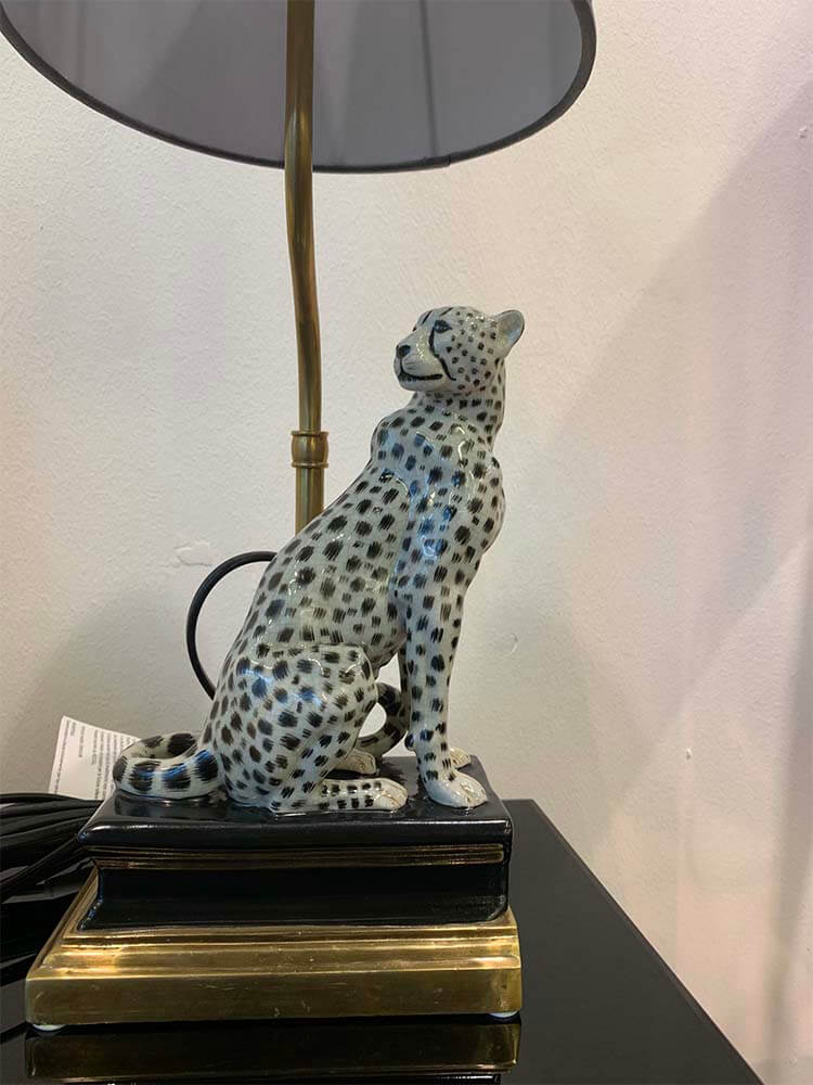 Leopard lamp with black base and gold accents