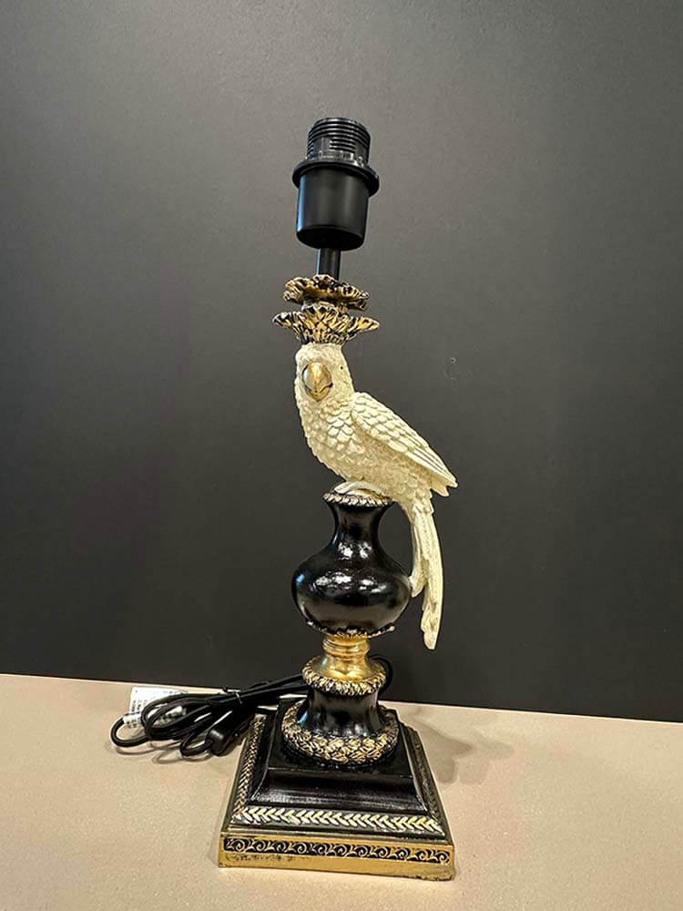 Antiqued Ornate Parrot Lamp Base featuring a cream, gold, and black parrot design.