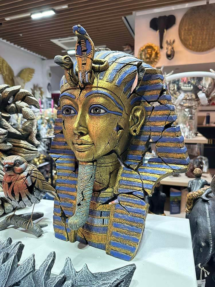 Egyptian King Tutankhamun Bust in gold by edge sculpture at Dutch Hospital