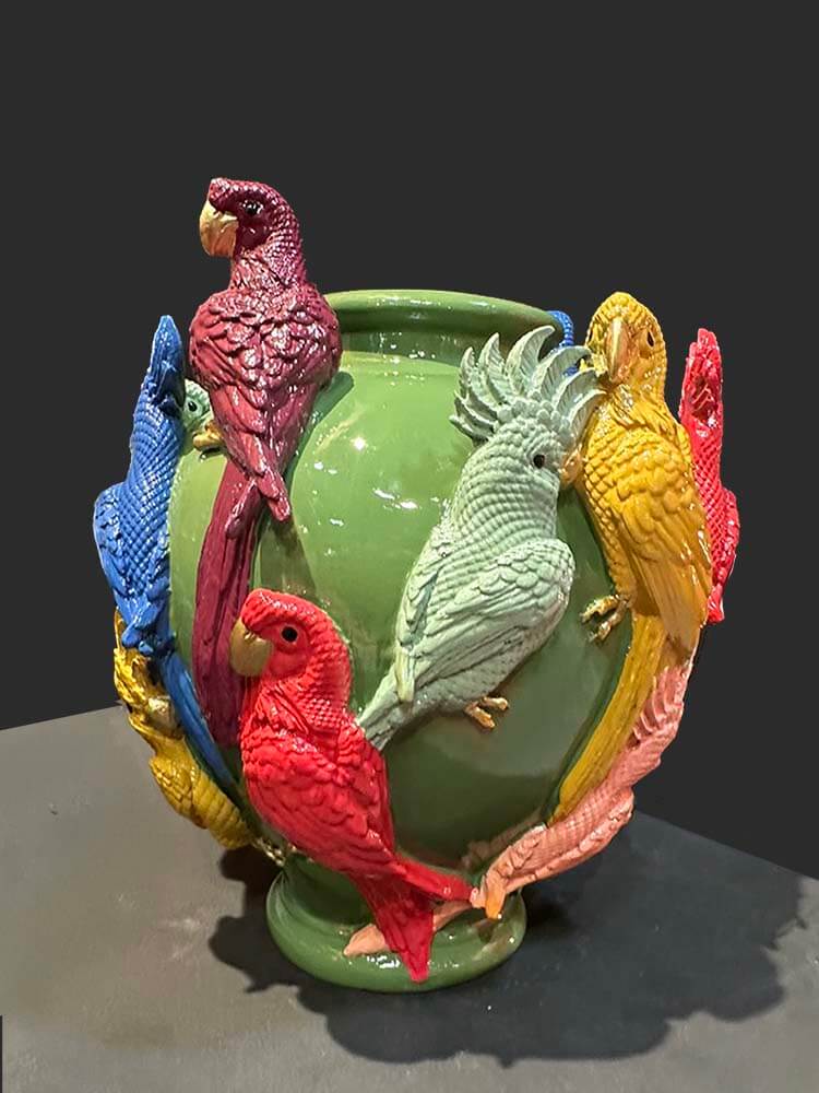 Statement vase decorated with richly coloured parrots