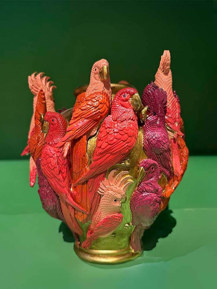 Ornamental vase featuring colourful parrot motifs