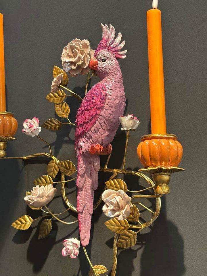 Decorative wall sconce with pink, gold, orange parrot figurine, flowers 