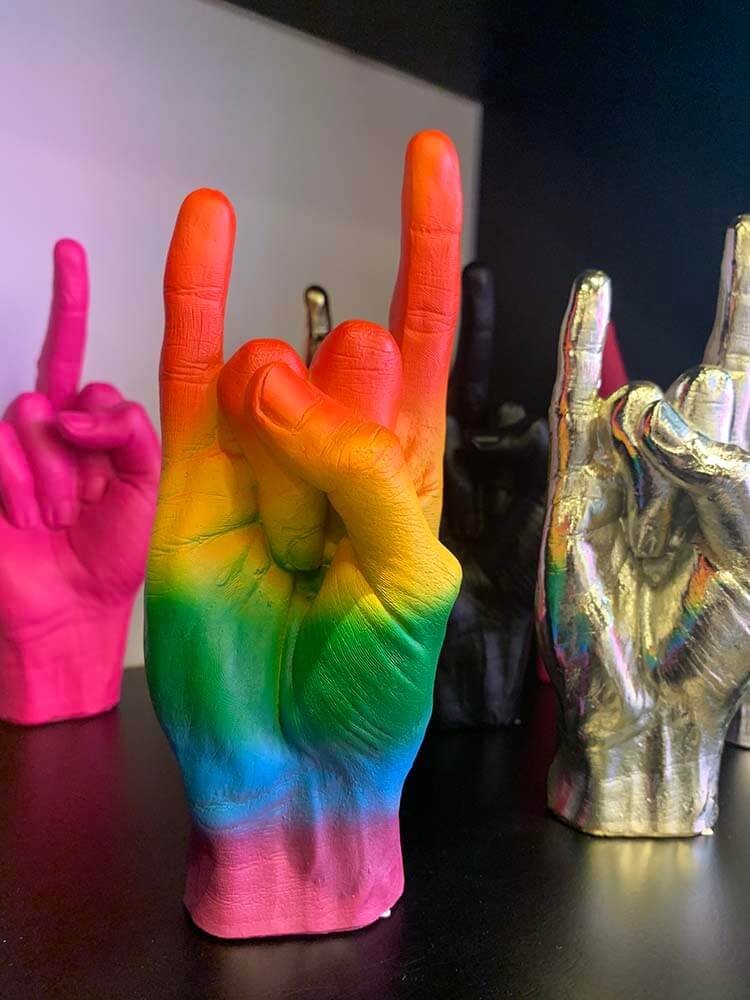 rock you hand sign symbol in rainbow colours 